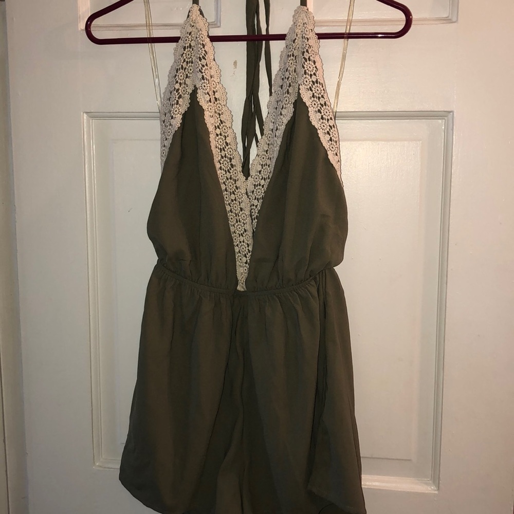 Green romper with lace